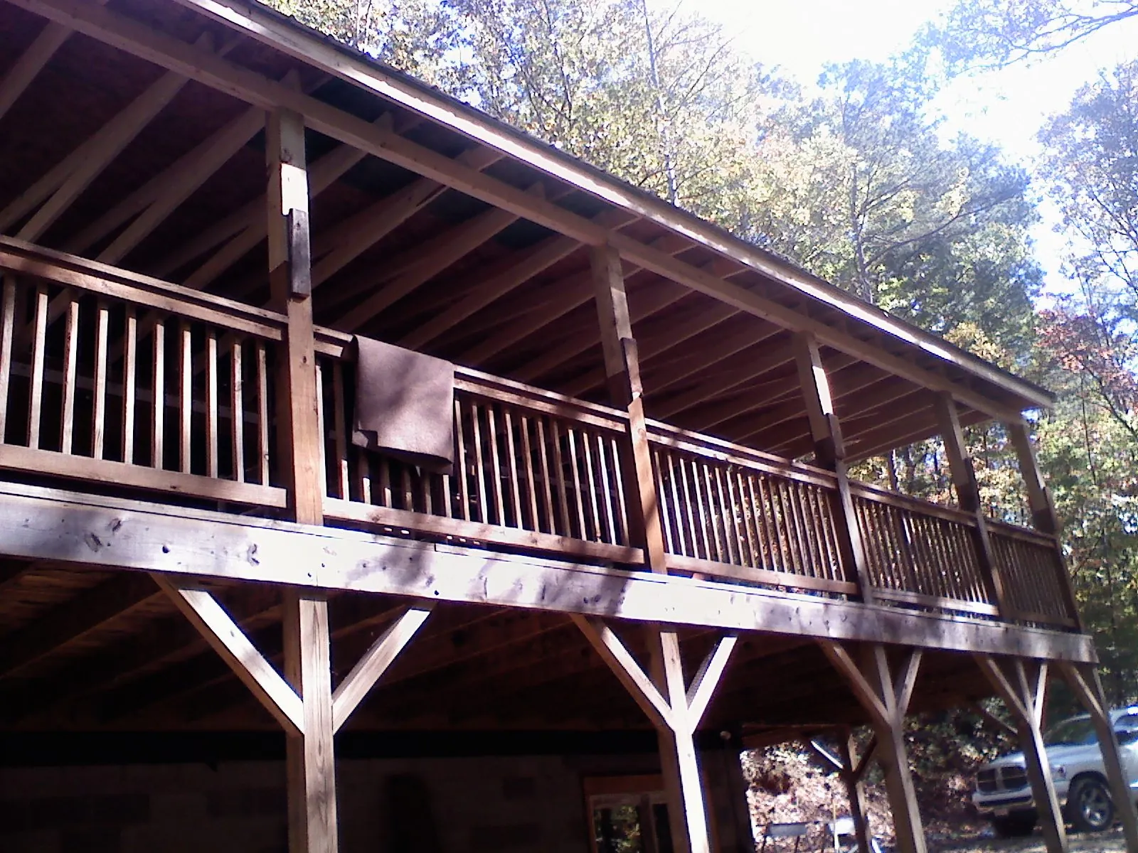 Timber framing under a new elevated porch and deck — Roof Leak Repair in Kendall by Roofing Brothers